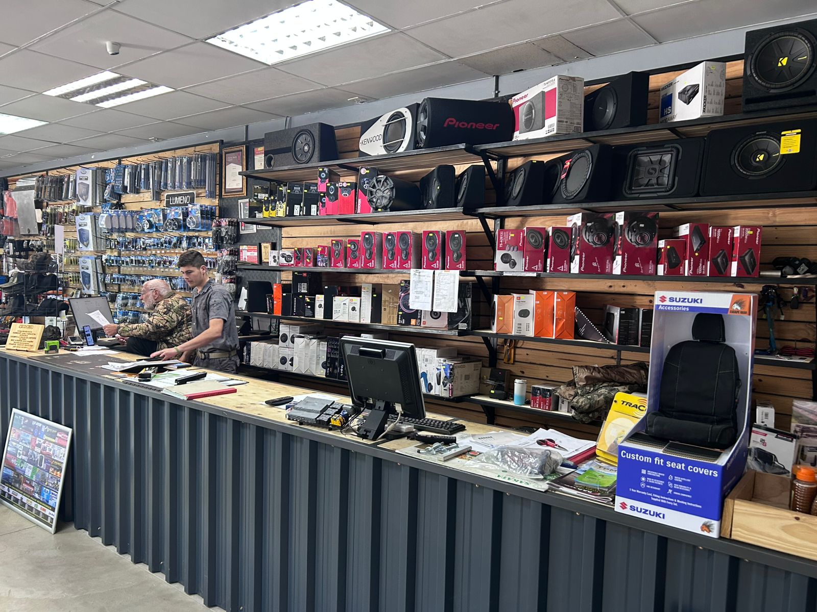 Service Counter & Audio - Professional service desk with car audio systems and expert consultation available at Audio Sat 4x4 store in Louis Trichardt