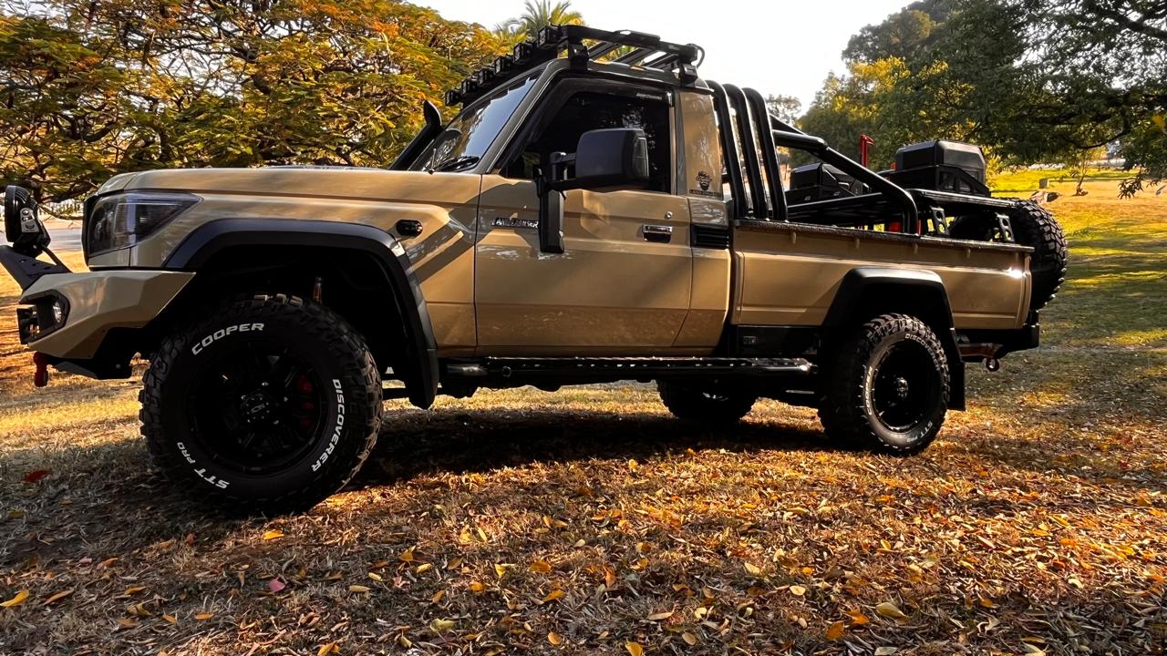 Land Cruiser Ultimate Adventure Build 4x4 build showcase - Complete professional transformation featuring comprehensive Onca protection package, Frontrunner roof system, premium lighting setup, and full Toughdog suspension for the ultimate off-road adventure vehicle. by Audio Sat 4x4